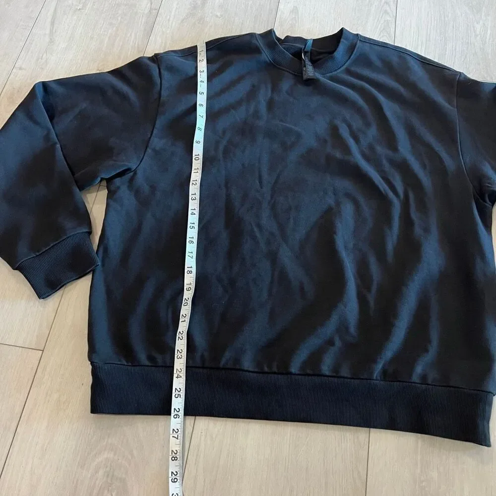 Skims women’s black sweater size M